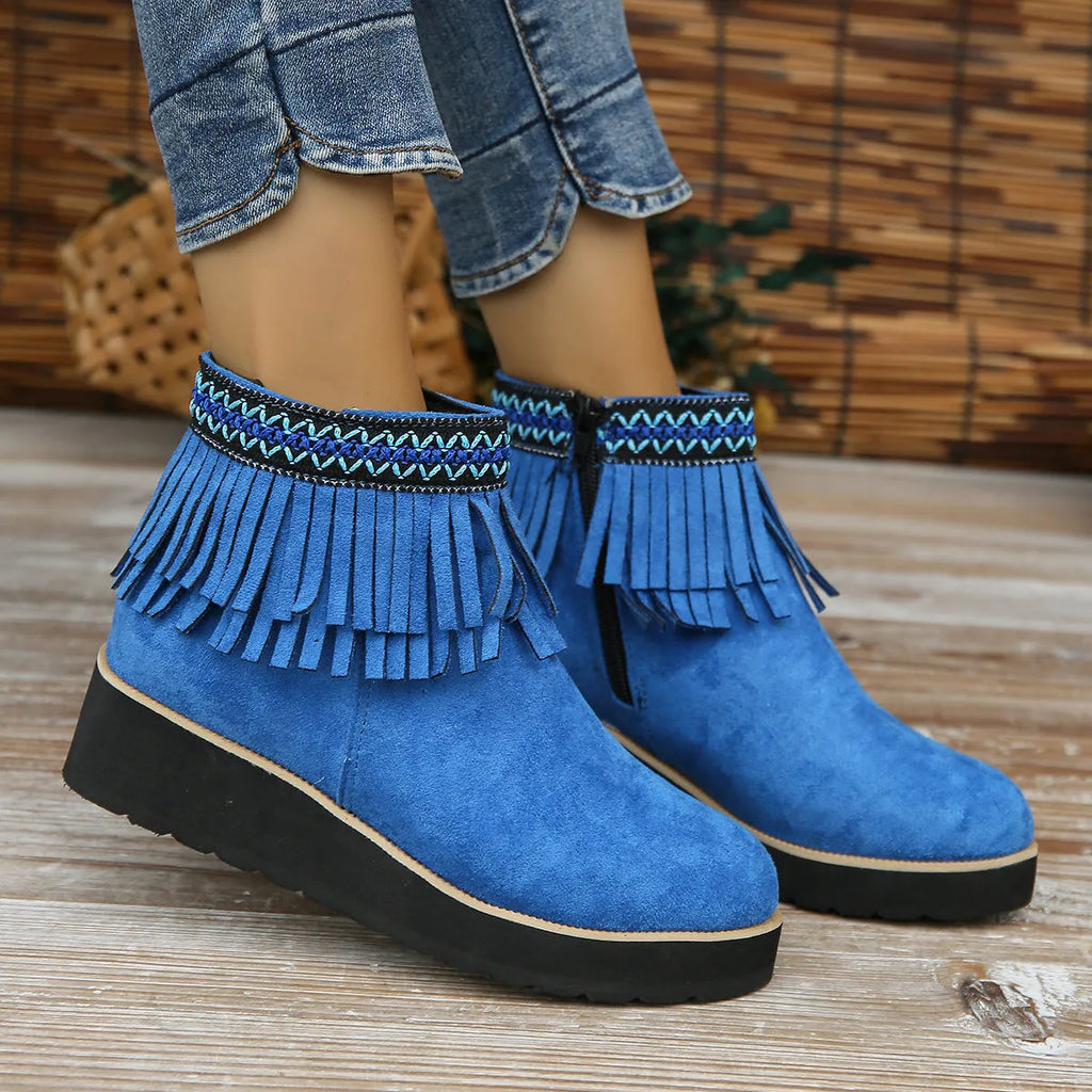 Women's wedge boots with suede upper, waterproof platform, thick rubber sole, side zip, and tassel detail