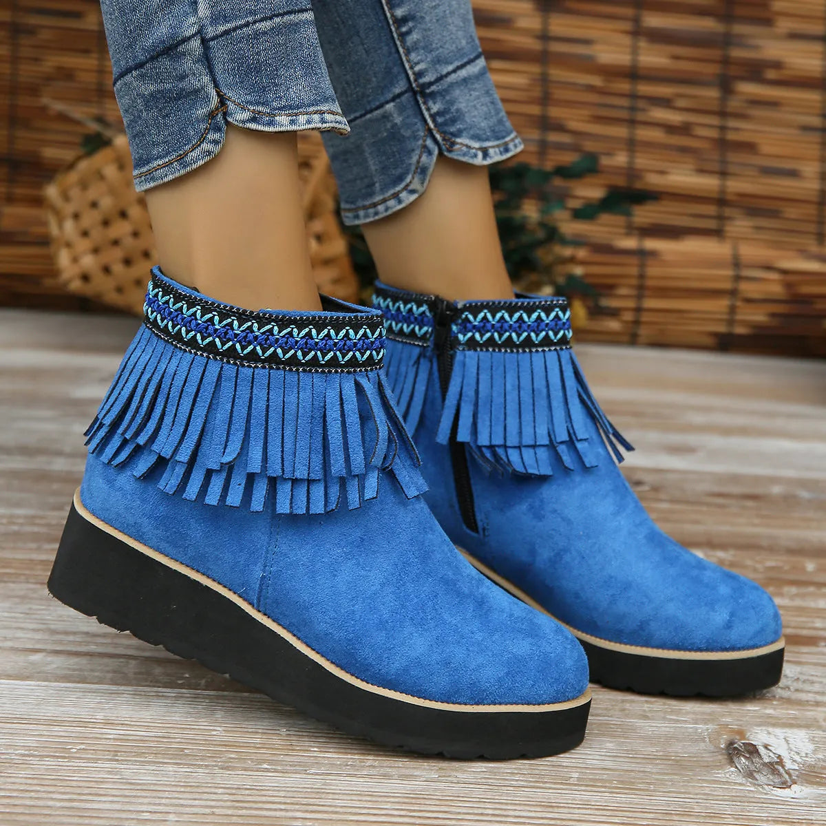 Women's wedge boots with suede upper, waterproof platform, thick rubber sole, side zip, and tassel detail