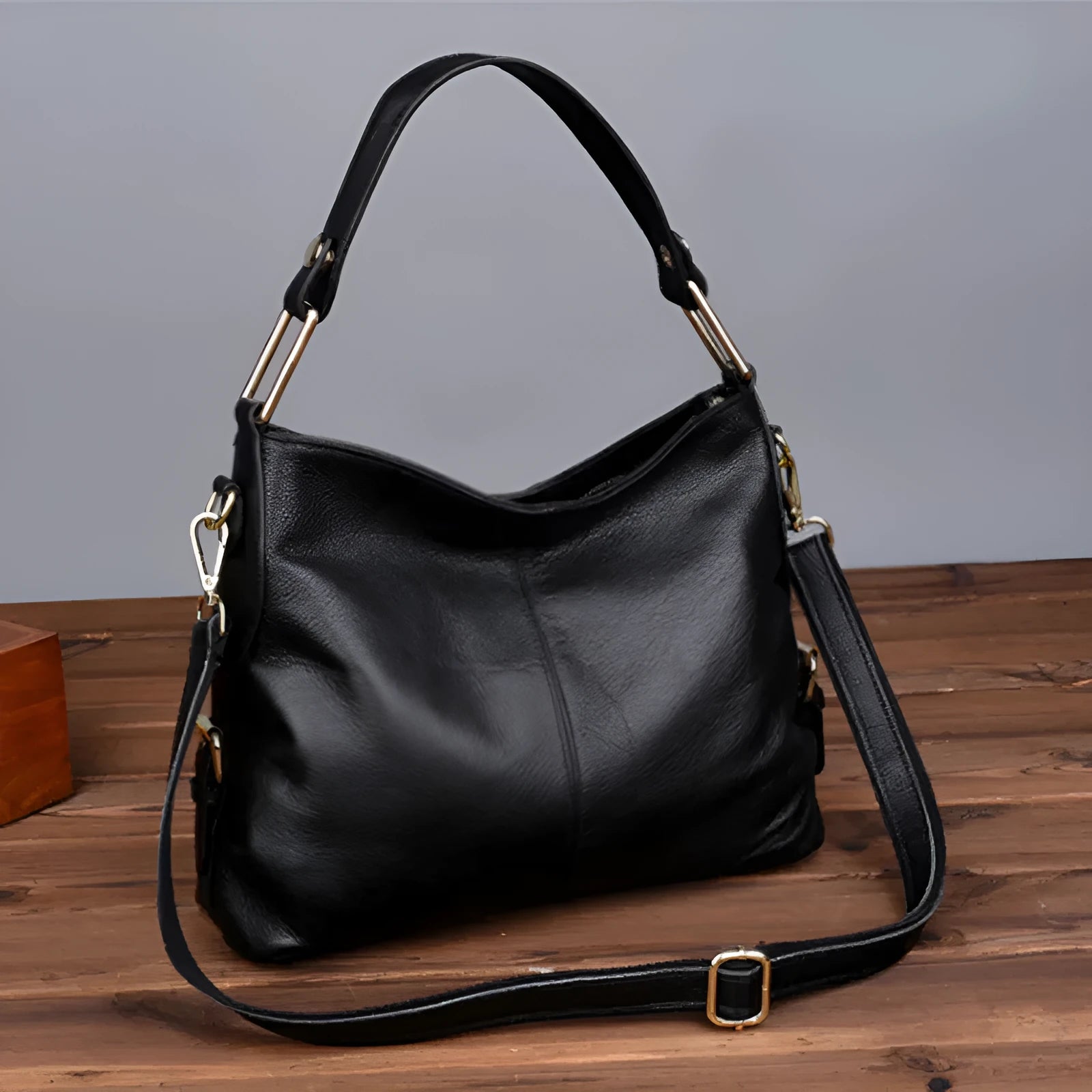 Genuine leather crossbody bag in vertical square shape with internal phone and document compartments