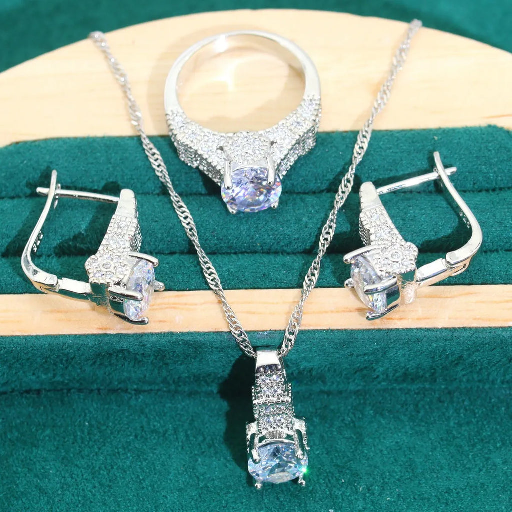 Bridal zircon necklace, earrings, ring, and bracelet four-piece jewellery set in alloy.