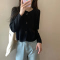 Women's long-sleeved acrylic cardigan coat in milky white, red, pink, light purple, or black.
