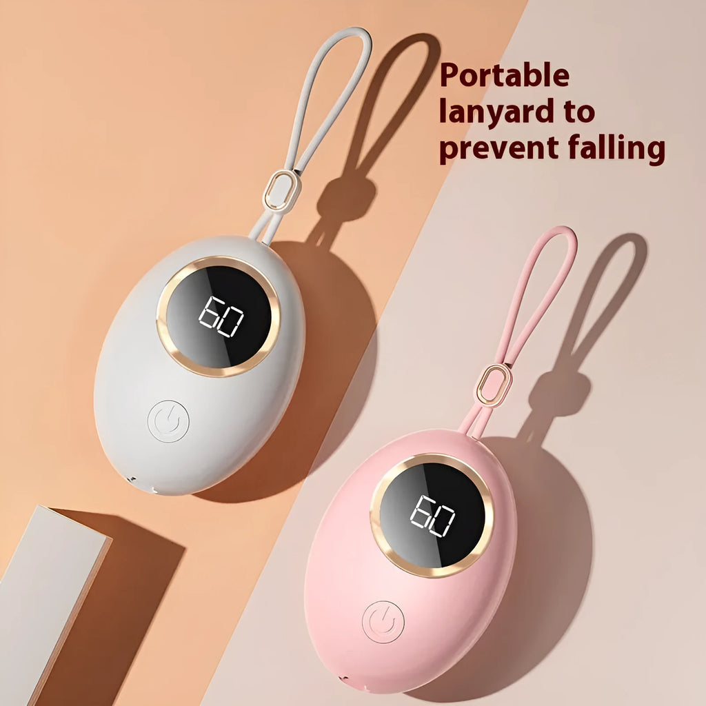 USB digital display hand warmer in pink, showing aluminium heating pad and screen