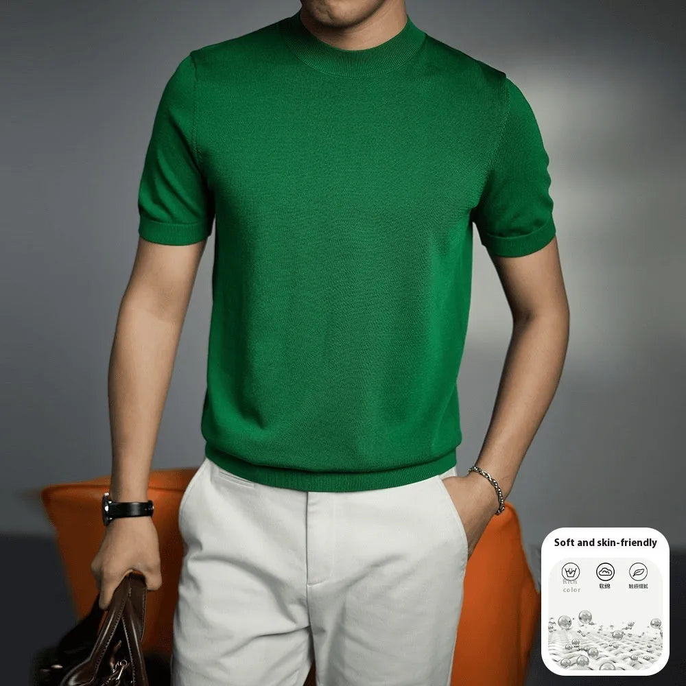 Men's solid colour knitted T-shirt with round neck and short sleeves on a grey background.