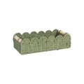 Rectangular woven paper storage basket in a choice of colours on a wooden table.
