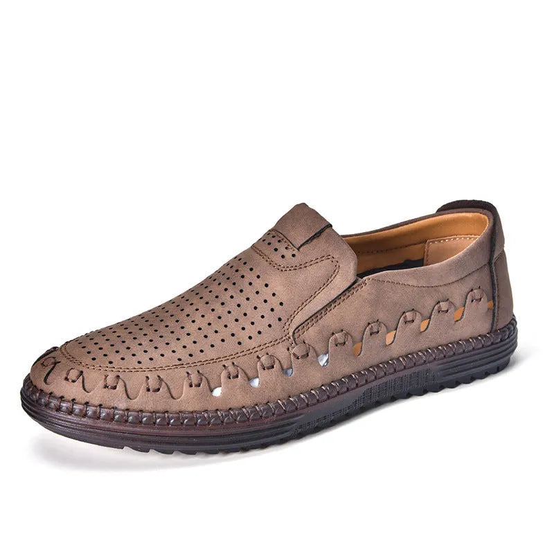 Men's brown slip-on casual shoes with artificial PU upper and visible sewing construction around PVC sole