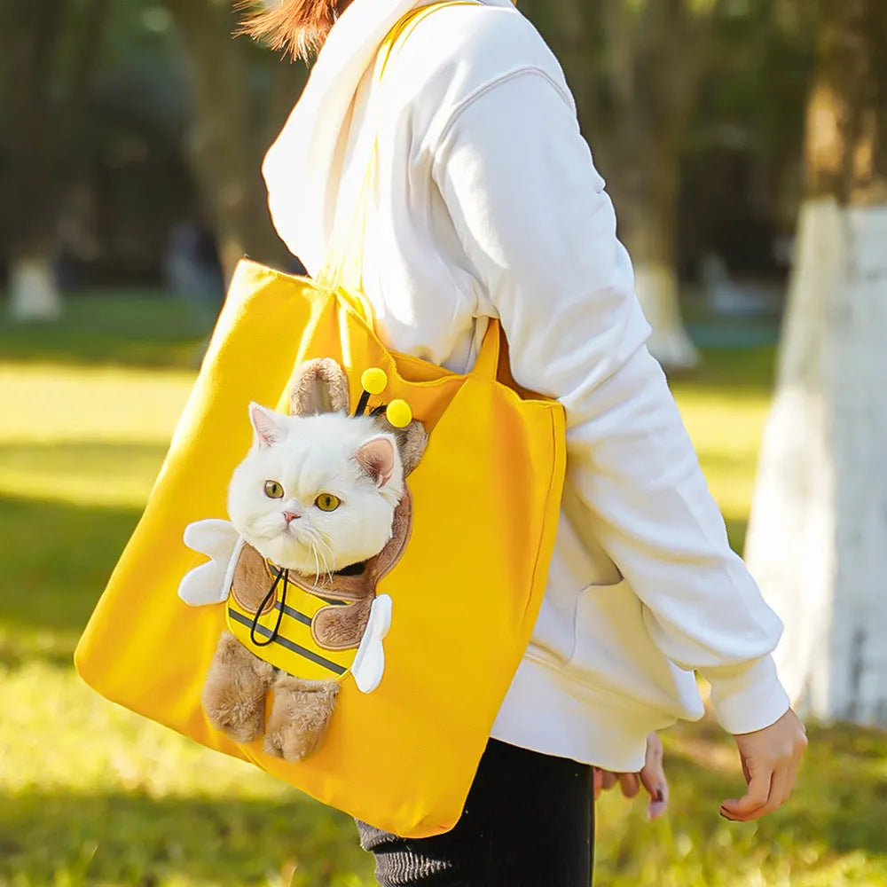 Soft canvas pet shoulder bag with cartoon pattern, shown in Light Denim colour for carrying small dogs or cats.