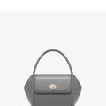 Women's leather wing-shaped tote bag with hard handle and cross-body strap in four colour options