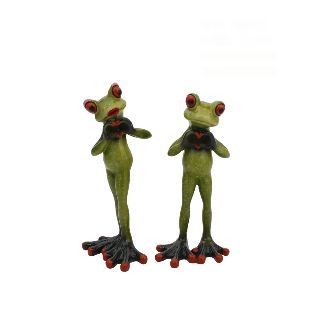 Pastoral style synthetic resin frog figurine home decoration on a wooden surface.