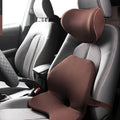 Memory foam car seat cushion set showing waist pad and headrest in neutral colours