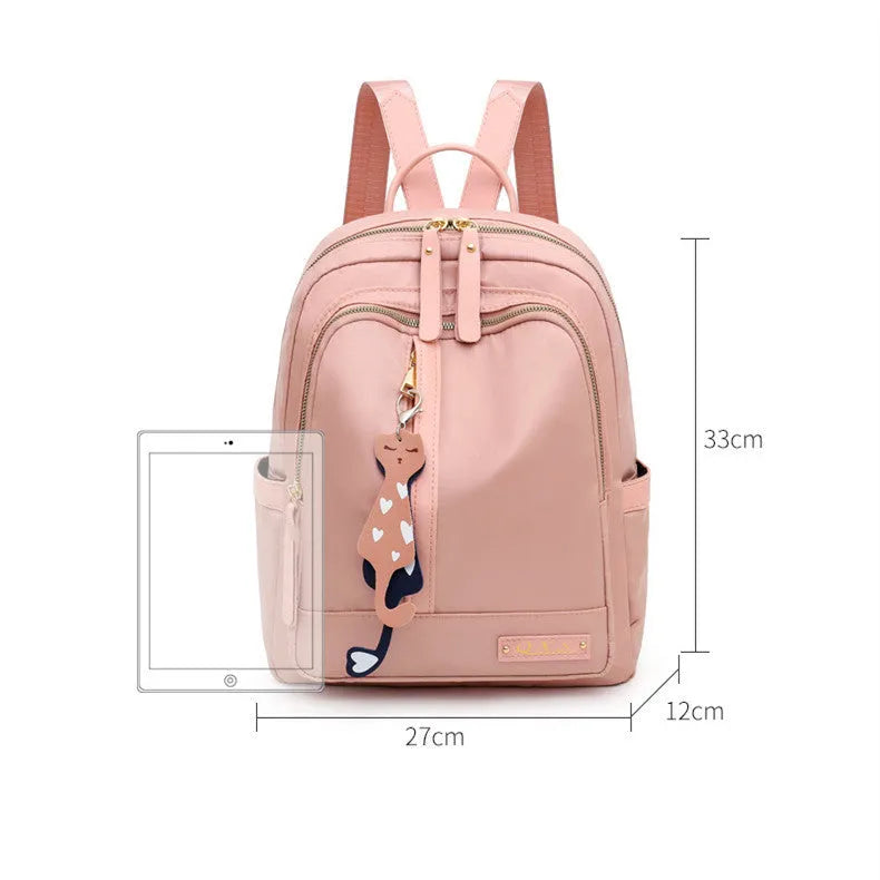 Women's black waterproof casual backpack with double shoulder straps and internal organisation compartments