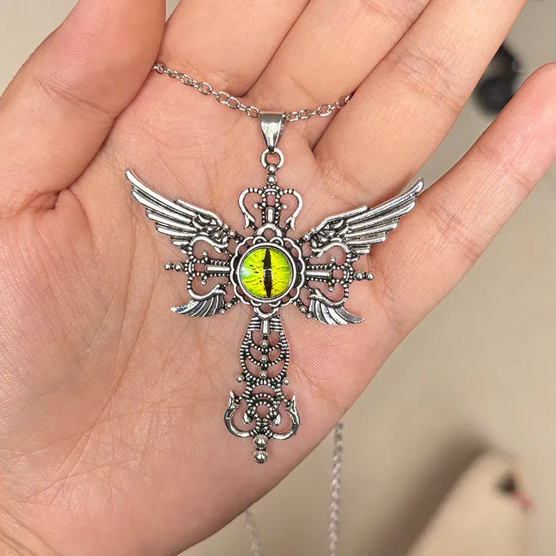 Geometric devil wings and cross pendant necklace in alloy, shown in multiple colour options.
