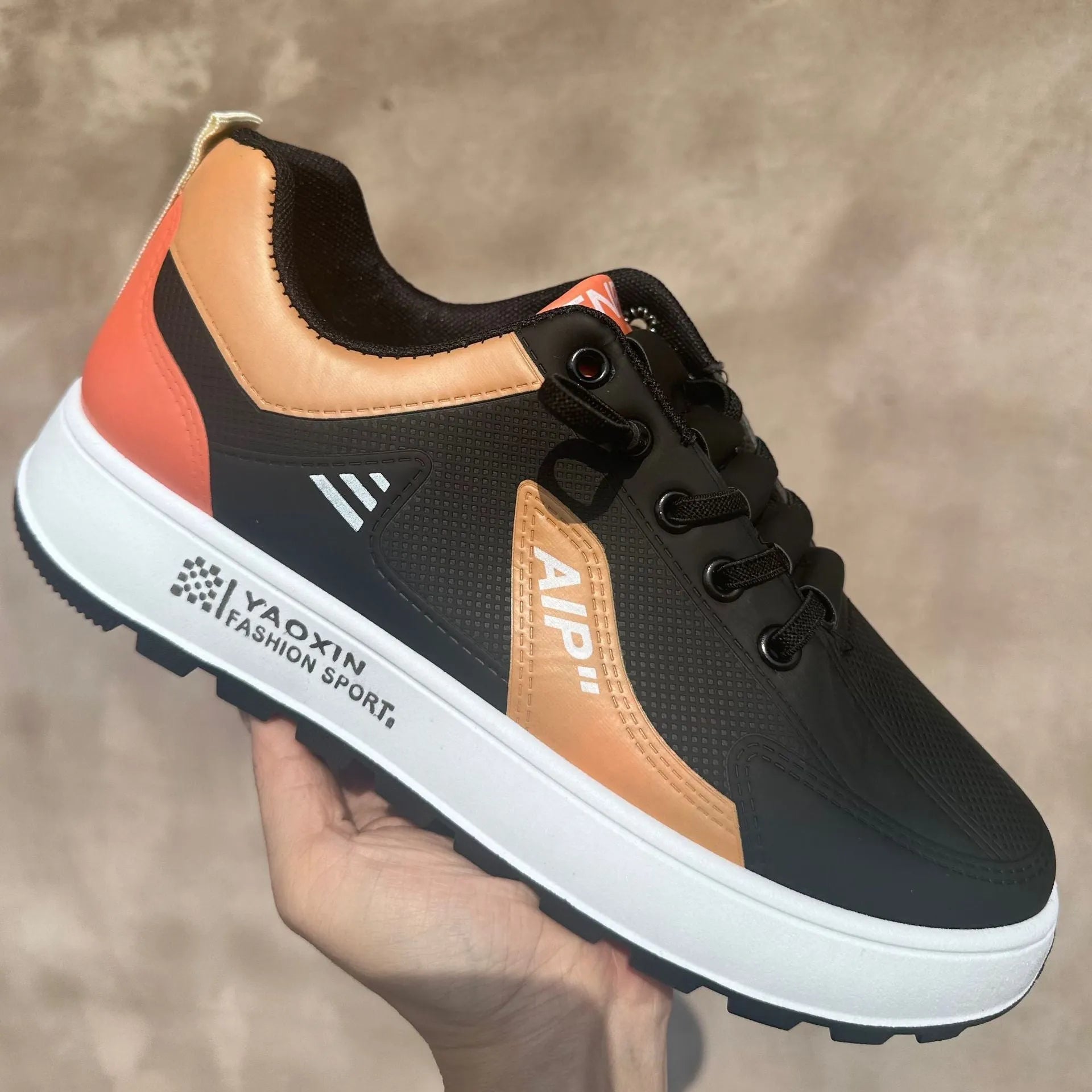Men's casual shoes with round toe and artificial PU upper in white with black, white with brown, and white with orange colour options