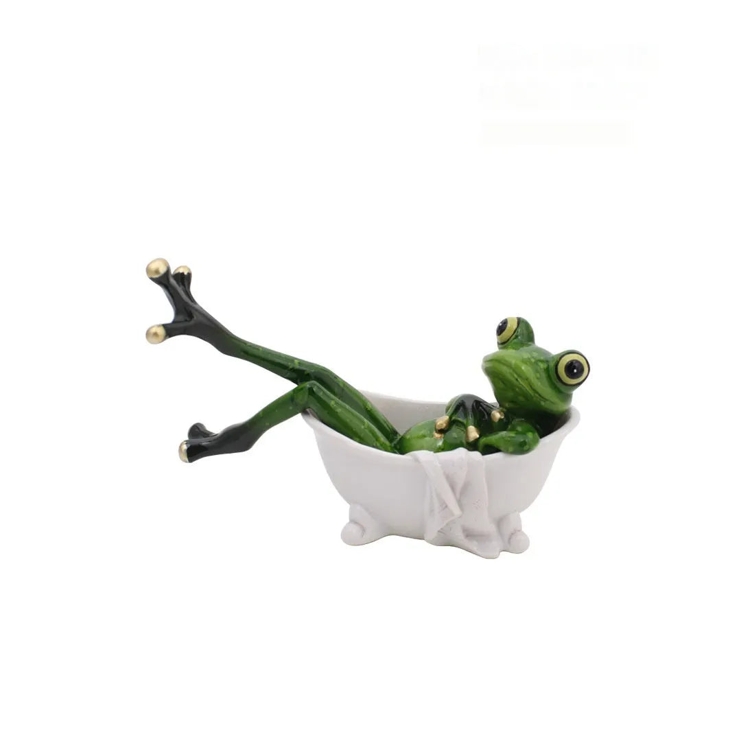 Pastoral style synthetic resin frog figurine home decoration on a wooden surface.