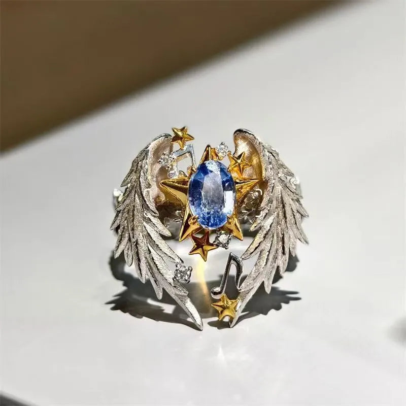 Adjustable geometric open-mouth ring with oiled alloy finish