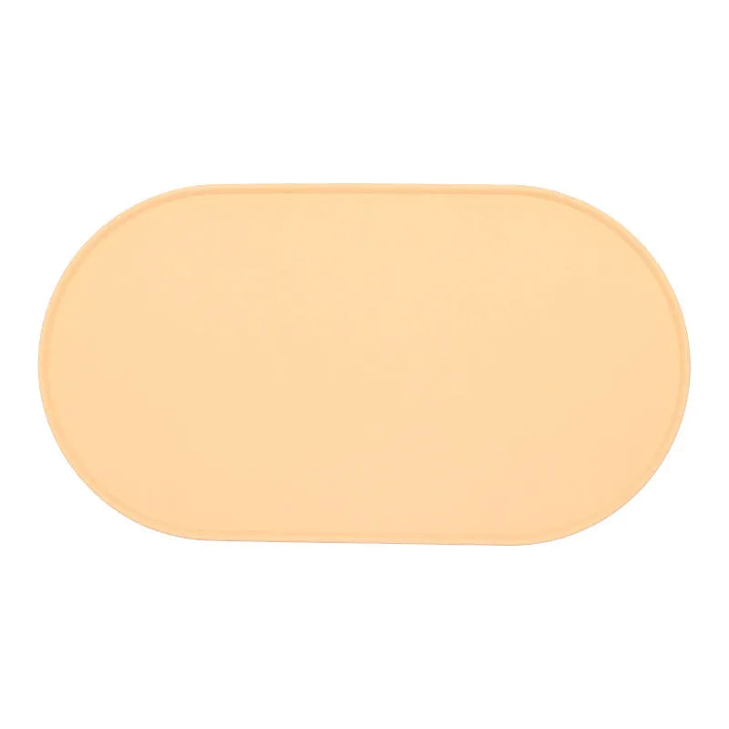 Silicone waterproof cat meal cleaning placemat in beige colour on wooden floor