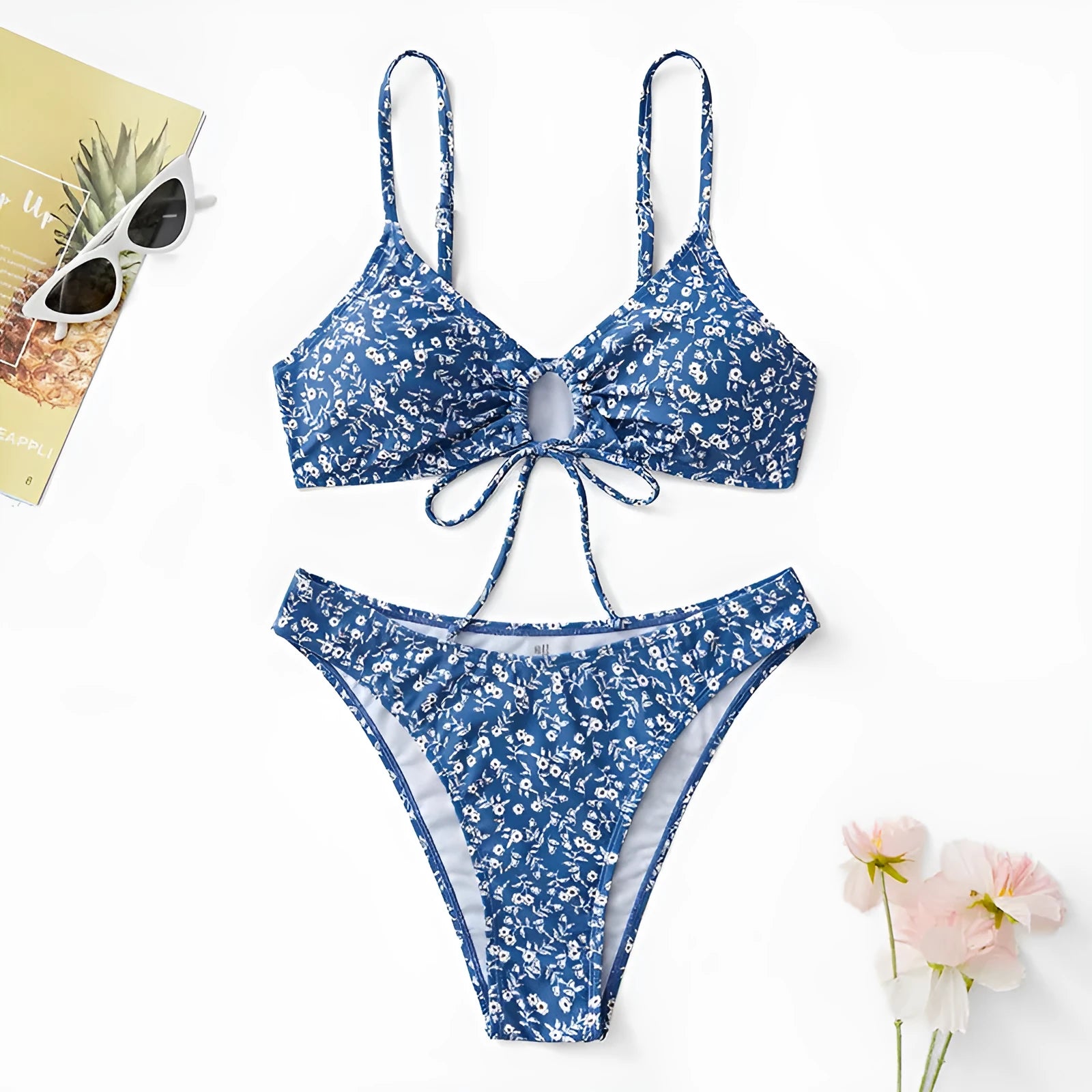 Blue polyester three-piece swimsuit set with separate top and shorts