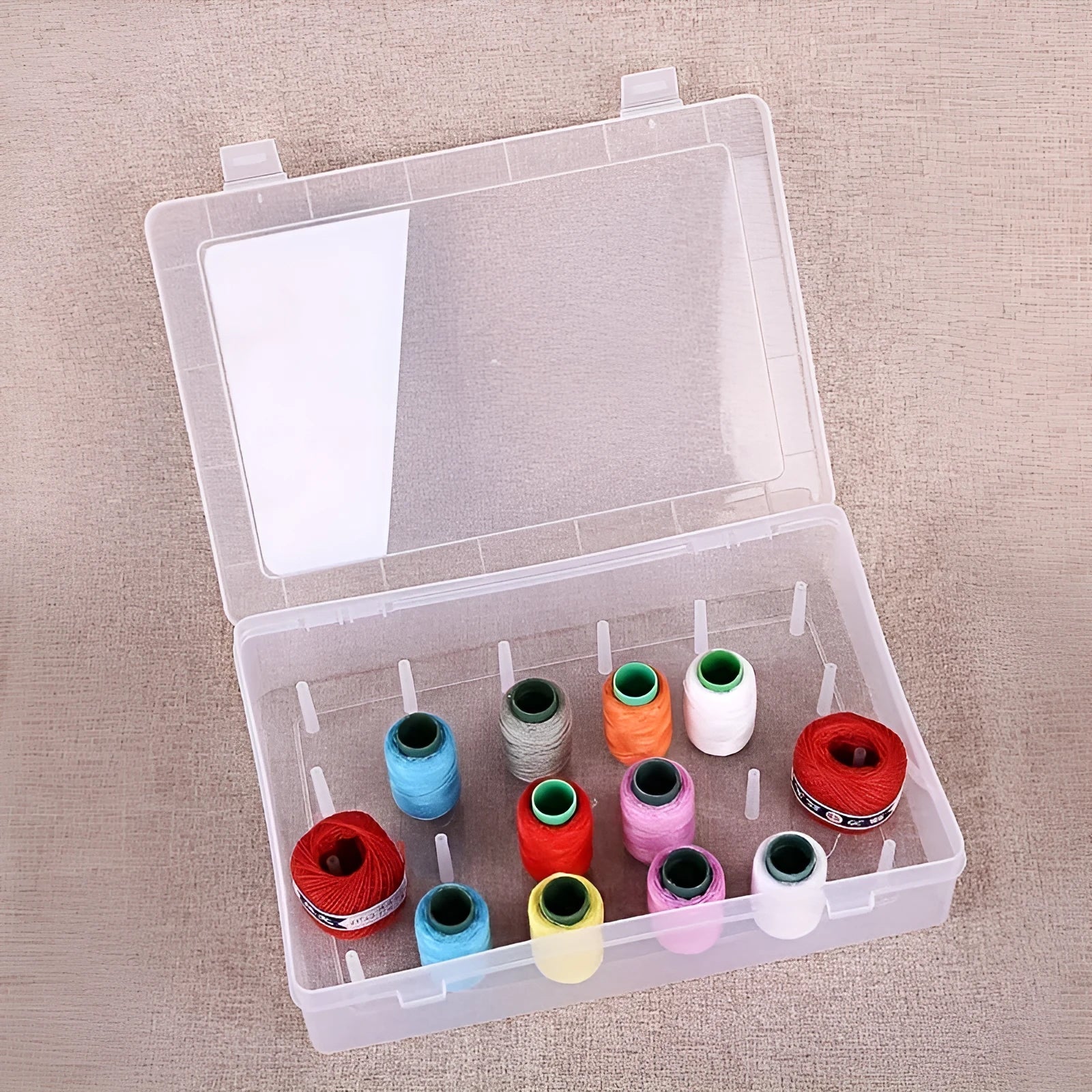 Plastic embroidery storage box with 42 compartments in transparent, pink, or blue colour options
