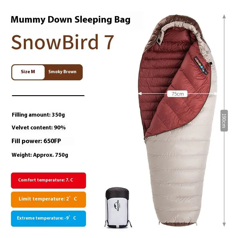 Goose down mummy sleeping bag shown with storage bag for camping and outdoor use