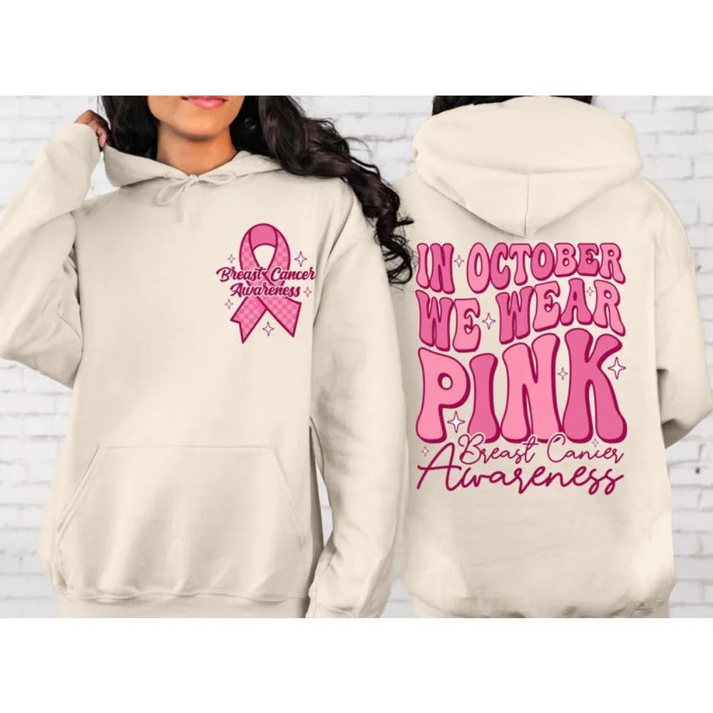 Breast cancer awareness hoodie with retro art pattern and side seam pockets in pink colour.