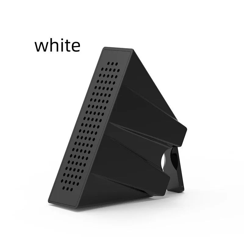 A small, coloured ABS plastic phone amplifier holder on a desktop, holding a mobile phone horizontally.