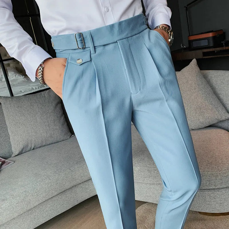 Straight leg casual trousers in solid colours on a hanger.