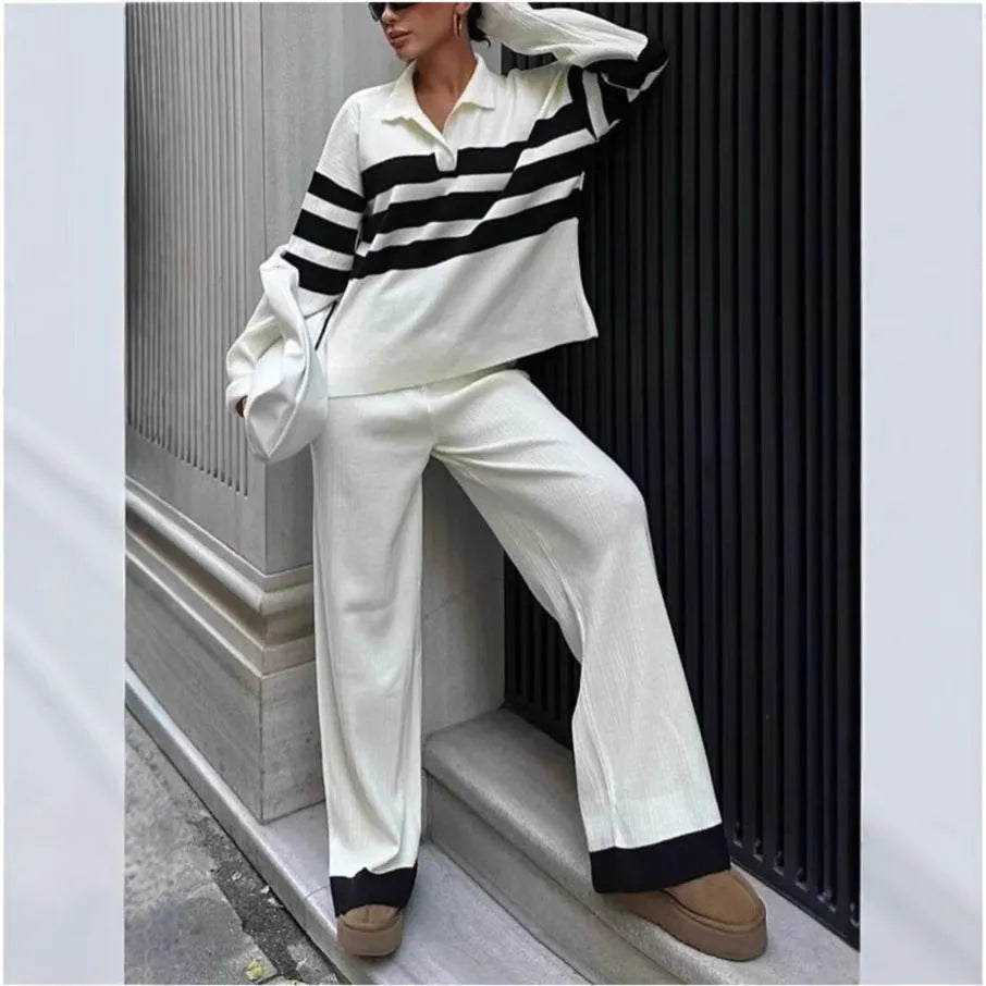 Women's black and white striped knitted polo shirt with matching trousers two-piece set
