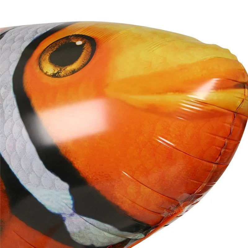 Large remote control inflatable shark balloon floating indoors with remote.