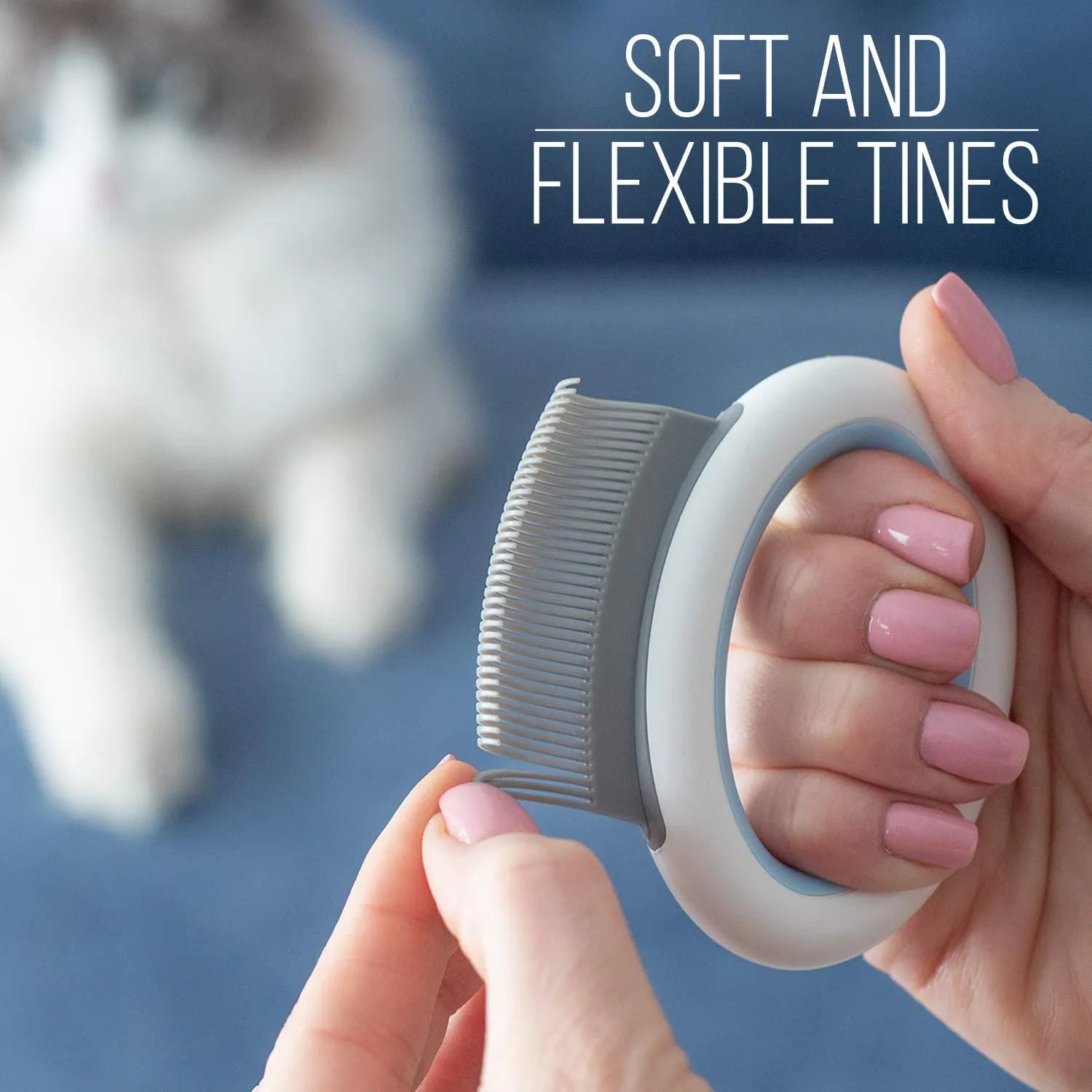 Blue pet grooming comb for cats and dogs on a white background.