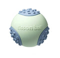 Green rolling ball dog toy on wooden floor showing 64mm diameter