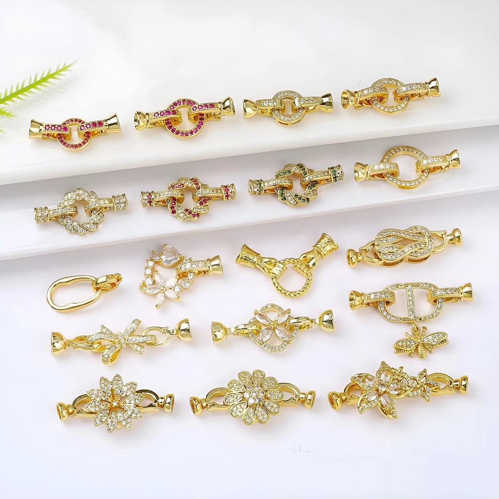 Small gold-coloured metal jewellery clasp for DIY necklace and bracelet making.