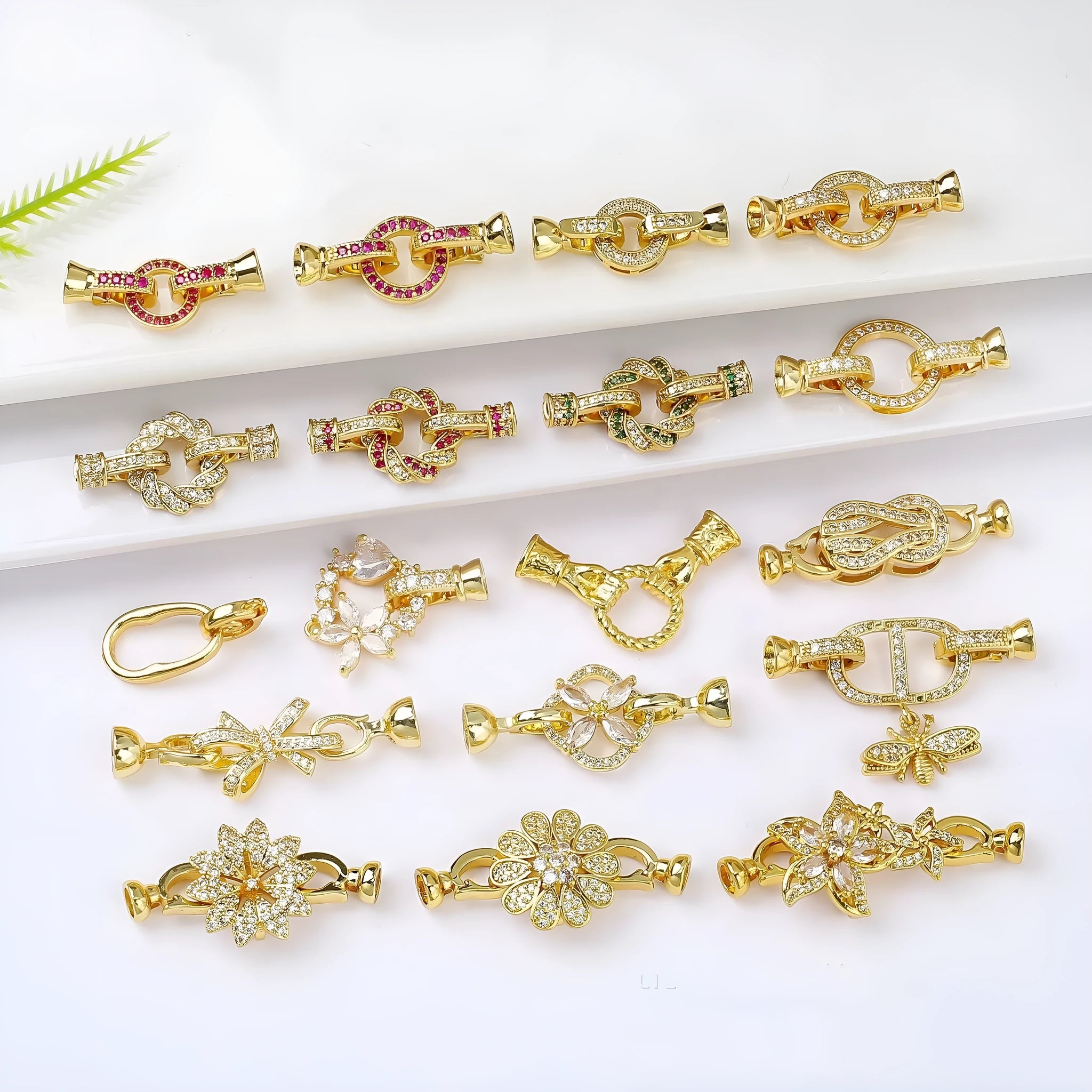 Small gold-coloured metal jewellery clasp for DIY necklace and bracelet making.