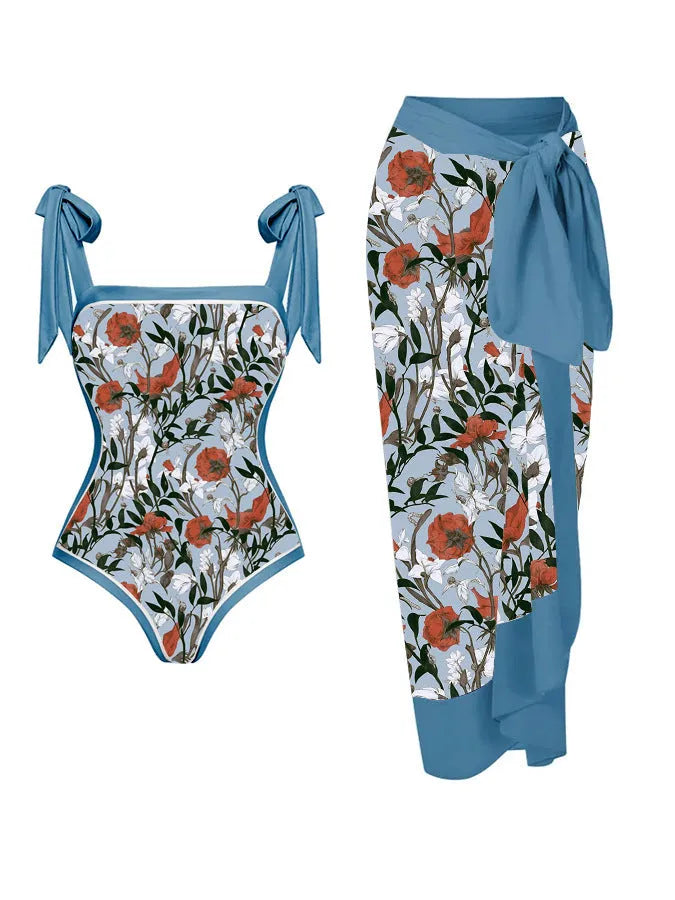 Women's printed chiffon two-piece swimsuit set with a separate hip skirt.