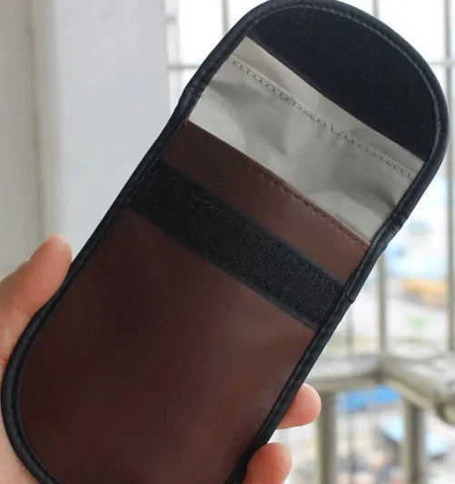 Black microfiber RFID blocking bag for car keys and cards measuring 13.5 by 9.5 cm