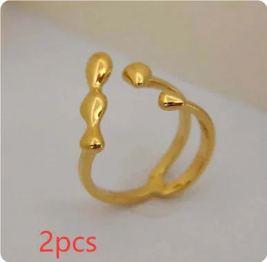 Brass fashion ring with spherical design in gold or silver colour for women's jewellery