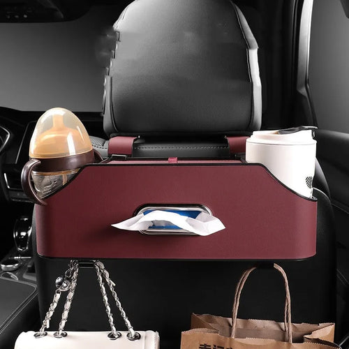 Genuine leather car tissue box and cup holder organiser in black, suspended from a headrest.