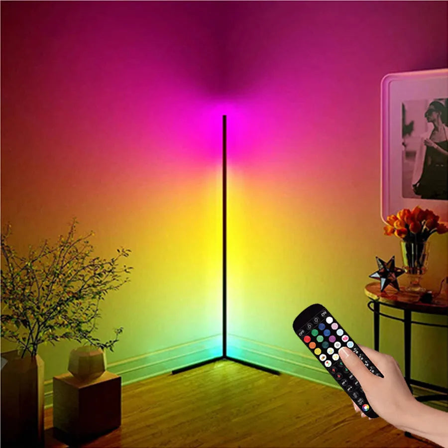 Black smart RGB floor lamp with remote control showing coloured lighting effects