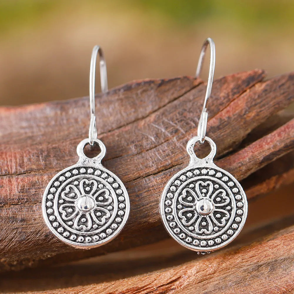 Round geometric bohemian earrings with distressed ethnic retro design in zinc alloy with electroplated finish