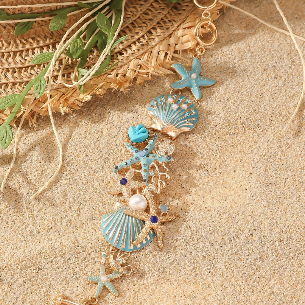 Women's marine boat anchor and starfish alloy bracelet in turquoise, coral red or coral blue colour