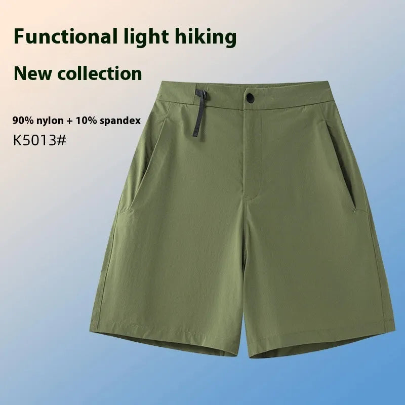 Men's solid colour quick-dry sports shorts with elastic construction for running and climbing.