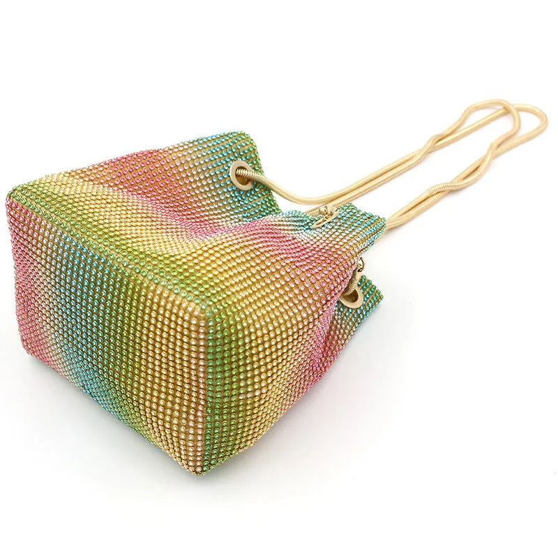 Rainbow rhinestone bucket bag with sparkling crystal surface and soft bucket shape