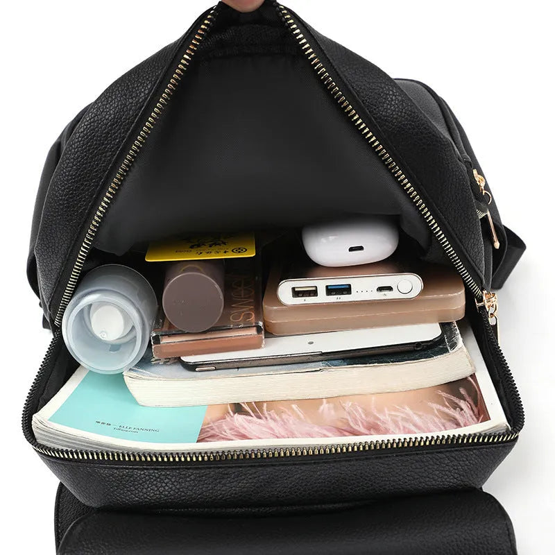 Soft PU leather women's backpack with textured finish and three-dimensional front pocket in taro purple