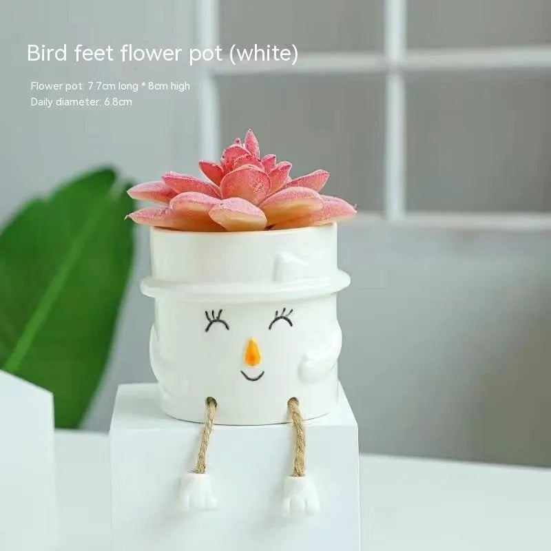 Ceramic hanging foot flowerpot with cartoon design for succulent plants on desktop