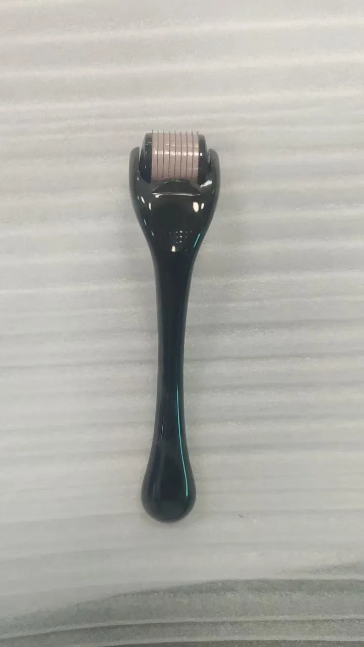 540 micro needle derma roller showing handle and wheel in different colour combinations with size specifications