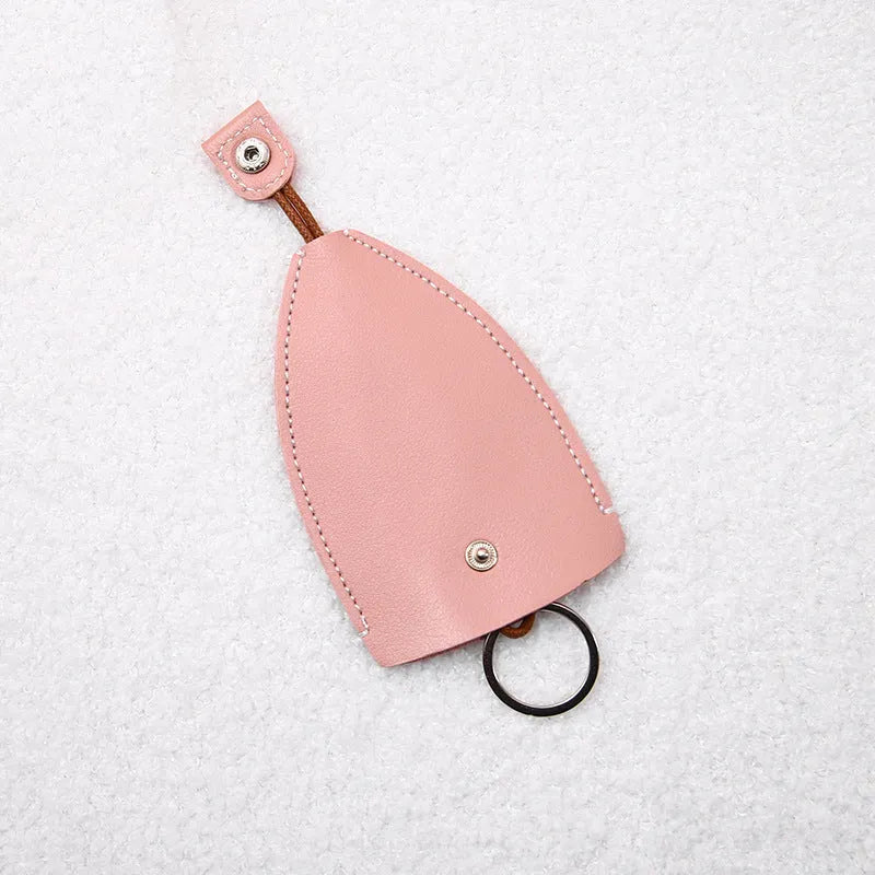 Cartoon design pull-out car key case made from soft PU leather, showing approximate size.