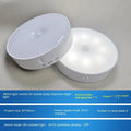 USB rechargeable body sensing LED night light in beige or white with 86mm diameter