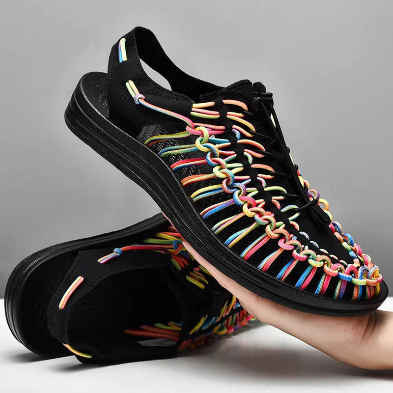 Woven Roman sandals with an elastic drawstring tie in multiple colour options on a rubber sole.