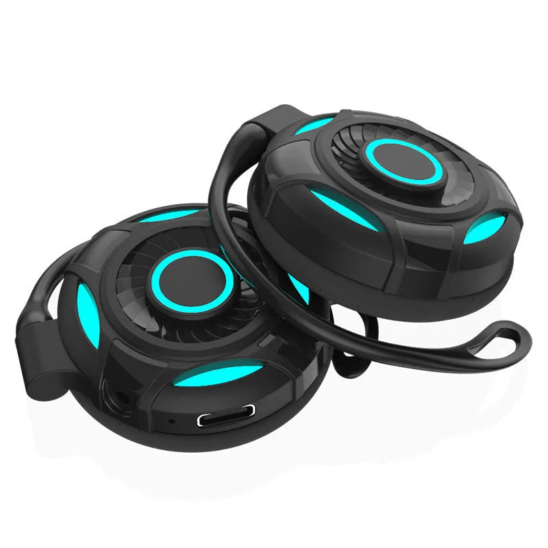 Black Bluetooth gaming earphones with hanging ear design showing USB charging port