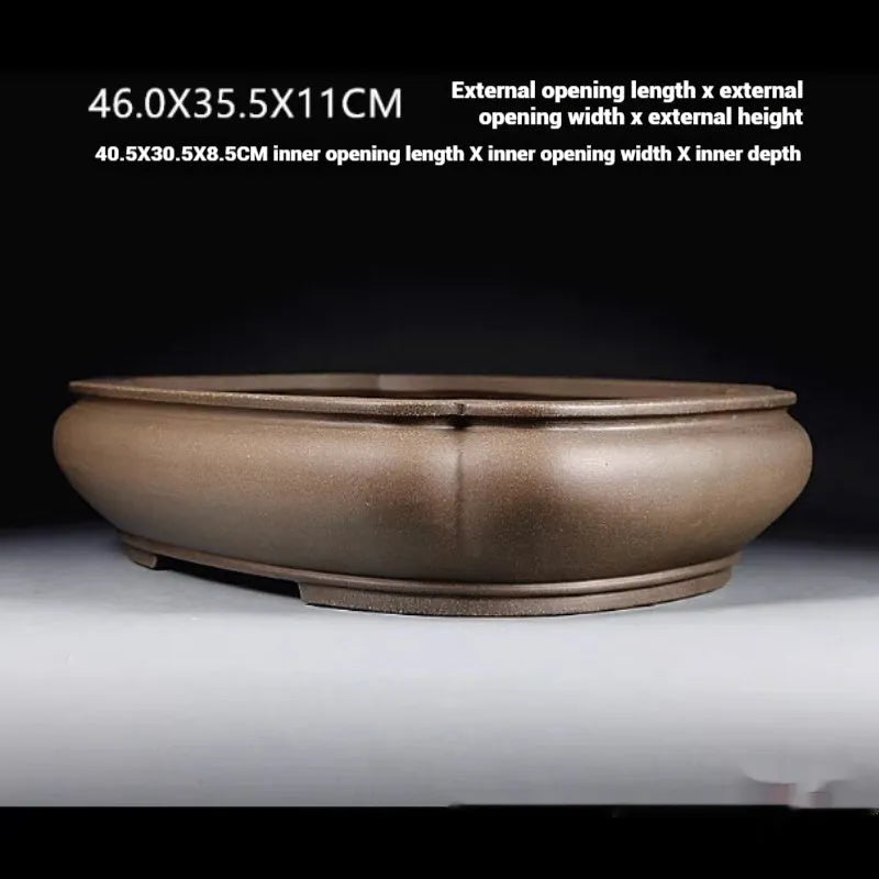Handmade antique papaya-shaped purple clay flower pot measuring 46x35.5x11cm
