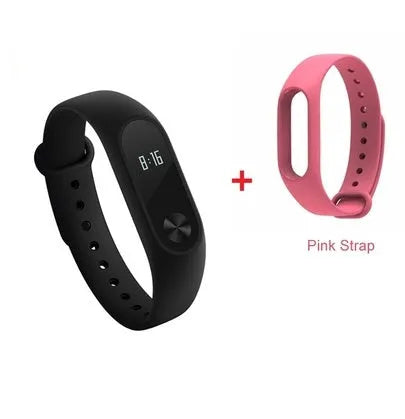 Black Xiaomi Mi Band 2 fitness tracker on wrist showing OLED display with heart rate data.