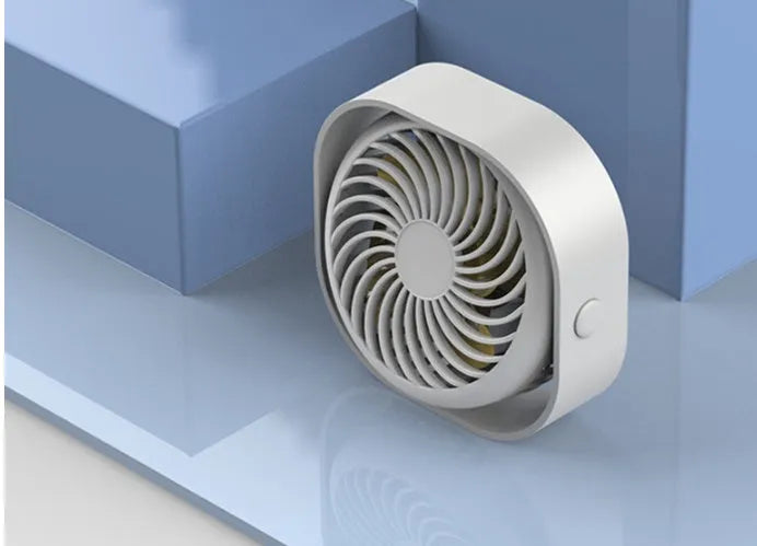USB desk fan in blue colour with 360-degree rotation head and rotary switch, showing modern simple design.